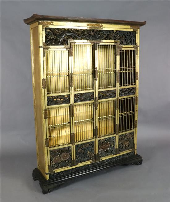 A Japanese gilt lacquered and polychrome wood cabinet, Meiji period, W. 3ft 8.5in., H. 4ft 11.5in.